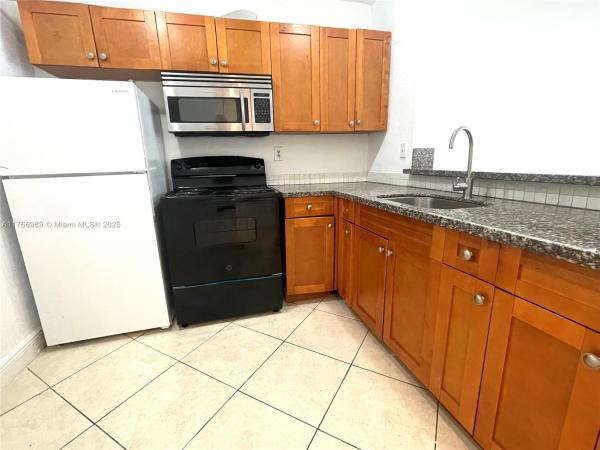 492 NW 165th St Rd #C-109, Unincorporated Dade County, Florida 33169, image 1