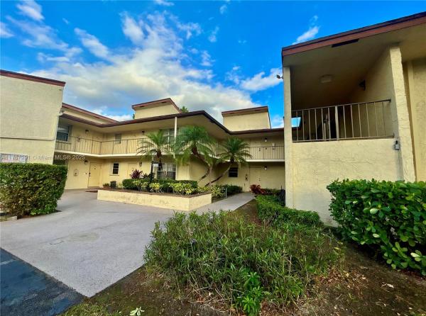 Holly Court At Woodmont, 8760 Holly Ct #204, Tamarac, Florida 33321, image 1
