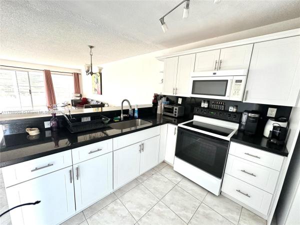 Sands Point, 8300 Sands Point Blvd #K306, Tamarac, Florida 33321, image 1