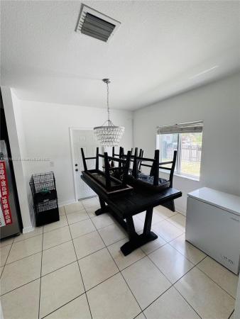 Seminole Lawn, 3257 NW 51st St, Brownsville, Florida 33142, image 3