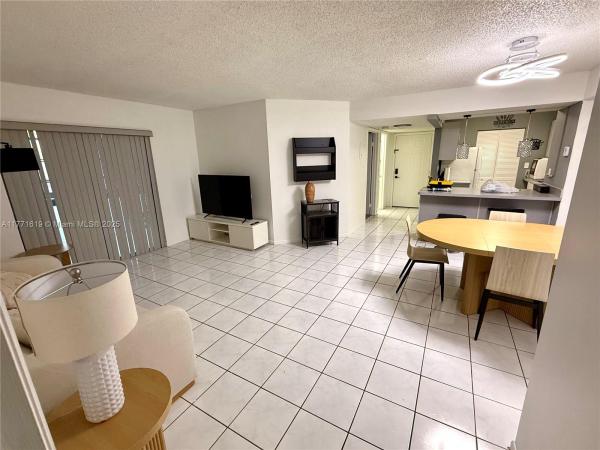 Carmel Lakes, 20741 NE 4th Ct #104, Ives Estates, Florida 33179, image 1