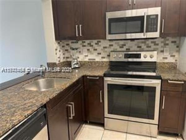 870 NE 207th Ter #201-9, Unincorporated Dade County, Florida 33179, image 1