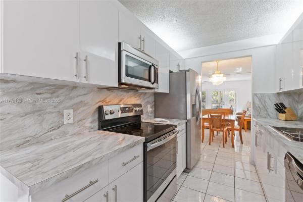 Cambridge At Century Village, 1251 SW 125th Ave #211T, Pembroke Pines, Florida 33027, image 1