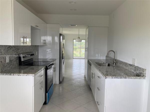 Cambridge At Century Village, 12701 SW 13th St #401F, Pembroke Pines, Florida 33027, image 1