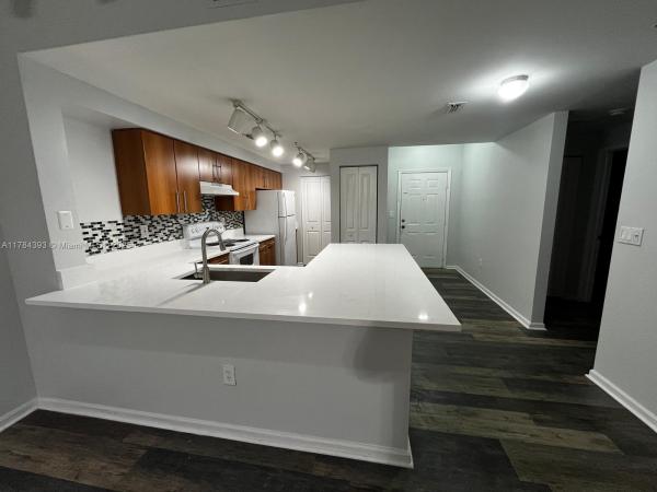 Poinciana Place, 5900 W Sample Rd #303, Coral Springs, Florida 33067, image 1
