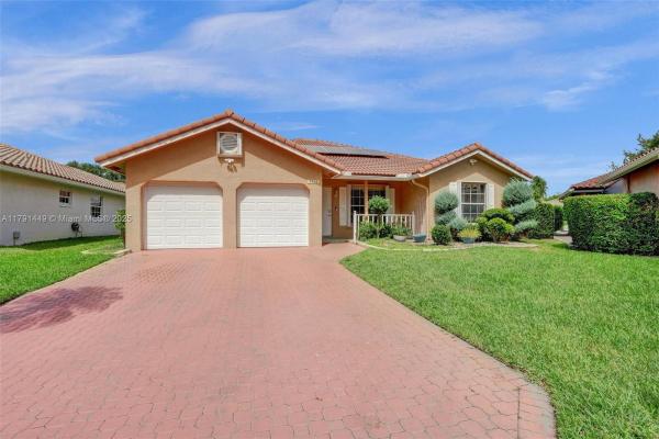 Springs Hamlet Villas, 1651 NW 106th Way, Coral Springs, Florida 33071, image 1