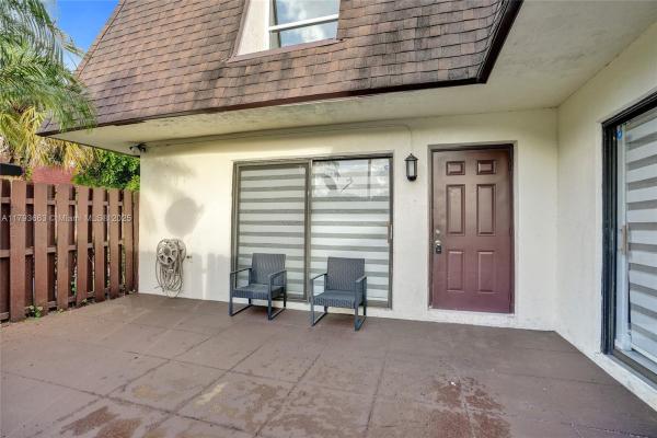 Willow Wood Townhomes, 7947 Tam Oshanter Blvd, North Lauderdale, Florida 33068, image 1