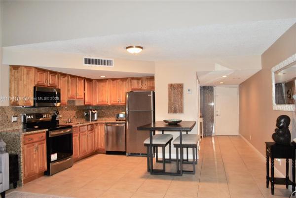 The Racquet Club Of Deer Creek, 49 Deer Creek Rd #E105, Deerfield Beach, Florida 33442, image 1