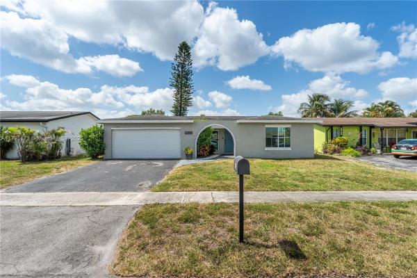 Sunrise Golf Village, 9652 NW 19th Pl, Sunrise, Florida 33322, image 1