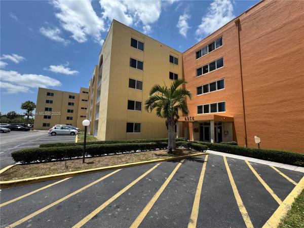 Coral Gate West, 6970 NW 186th St #3-406, Country Club, Florida 33015, image 1