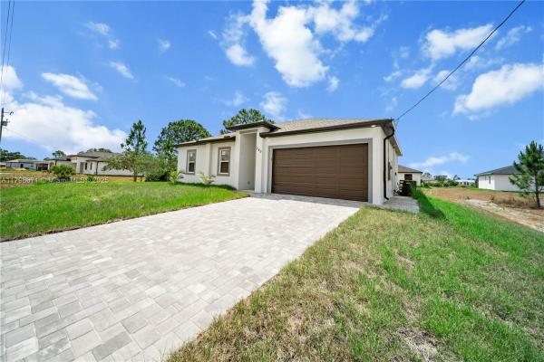 740 Newhall St E, Lehigh Acres, Florida 33974, image 1