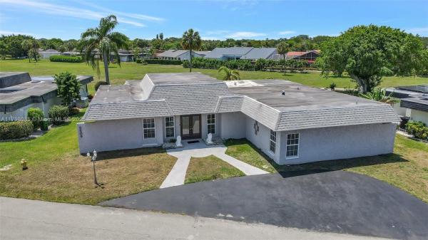 The Woodlands, 5509 Mulberry Dr, Tamarac, Florida 33319, image 1