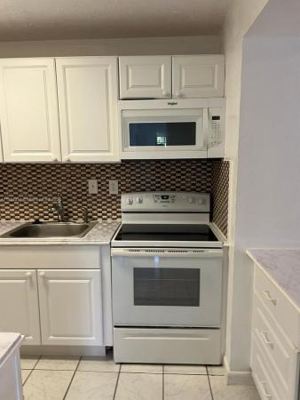 Carmel At The California Club, 927 NE 199th St #102, Ives Estates, Florida 33179, image 1