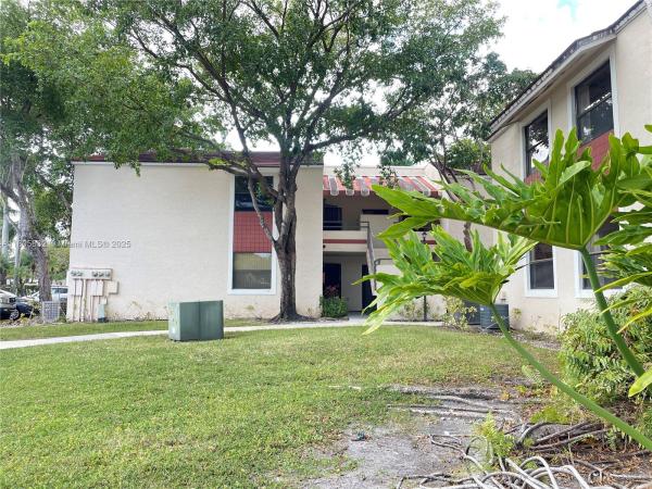 Quatraine, 20065 NE 3rd Ct #O3, Ives Estates, Florida 33179, image 2