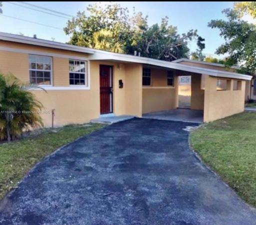 Bell Gardens, 18502 NW 23rd Ct, Miami Gardens, Florida 33056, image 1