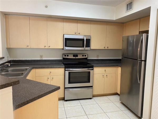 Emerald Isle At Laguna Lakes, 4151 San Marino Blvd #207, West Palm Beach, Florida 33409, image 1
