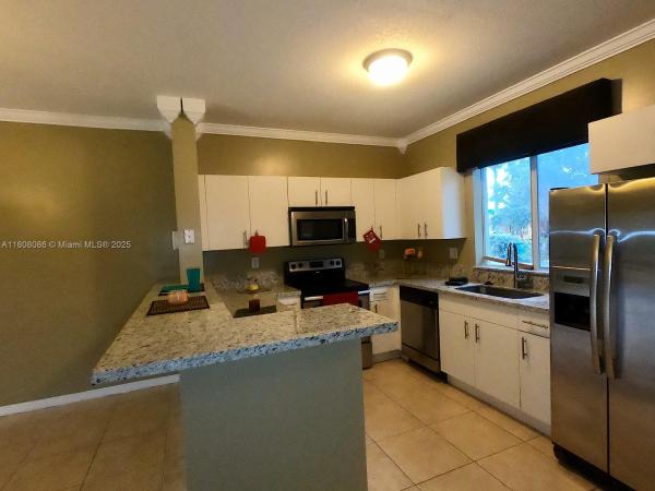 Country Club Villas Townhouses, 20423 NW 15th Ave #7, Miami Gardens, Florida 33169, image 1