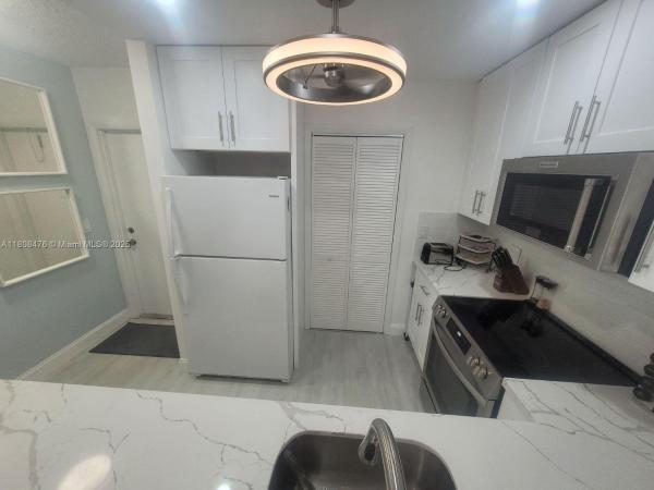 Paradise Harbour, 300 Golden Isles Dr #217, Hallandale Beach, Florida 33009, image 1