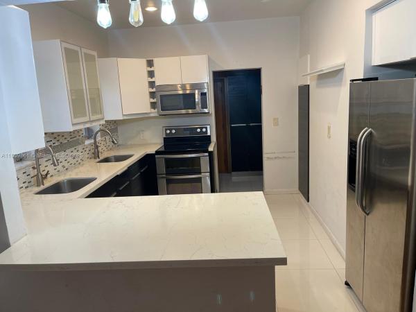 Surprise Lake, 330 W 46th St #1, Miami Beach, Florida 33140, image 1
