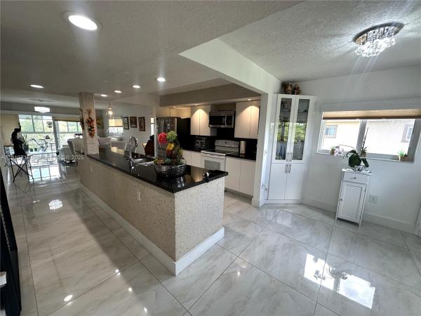 Suffolk At Century Village, 13700 SW 14th St #412D, Pembroke Pines, Florida 33027, image 1
