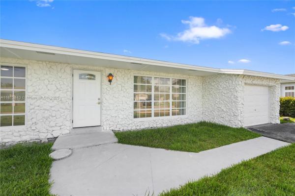 Sunrise Golf Village, 3830 NW 113th Ter, Sunrise, Florida 33323, image 1