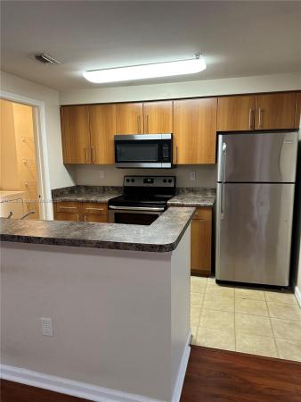 Poinciana Place, 5840 W Sample Rd #306, Coral Springs, Florida 33067, image 1
