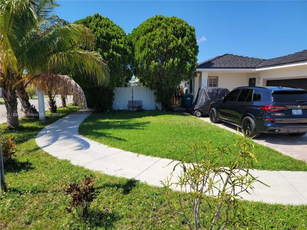 Adventure Homes, 14730 SW 142nd St, Country Walk, Florida 33196, image 2