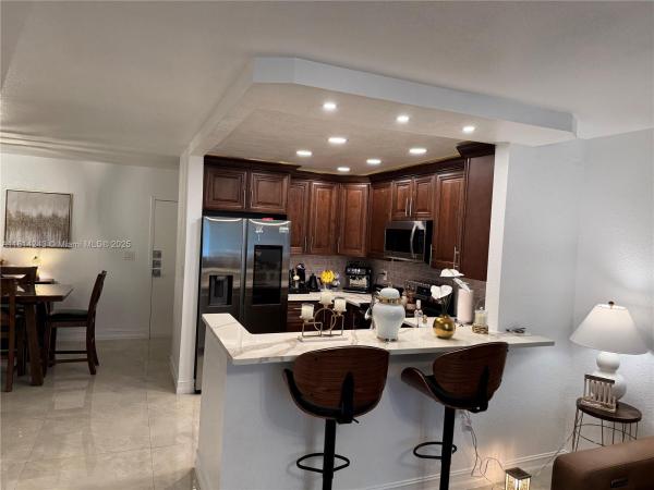 Omega, 7100 NW 17th St #404, Plantation, Florida 33313, image 2