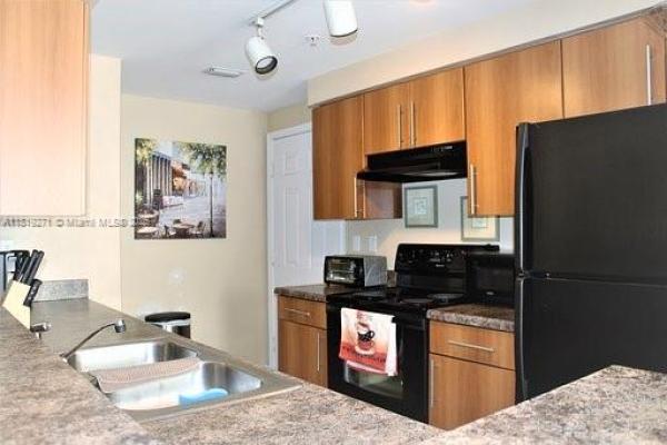 Poinciana Place, 5820 W Sample Rd #105, Coral Springs, Florida 33067, image 1
