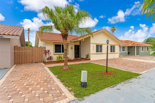 Munne Royal Homes, 14548 SW 98th Ter, The Hammocks, Florida 33186, image 2