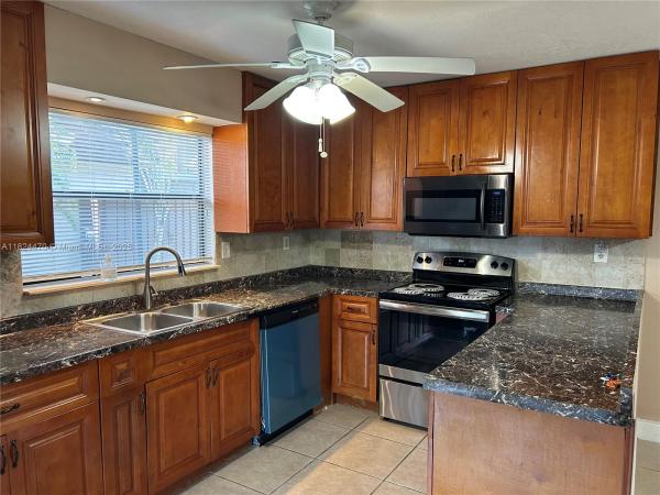 Villas At Woodland Greens, 5818 Swordfish Ct #D, Tamarac, Florida 33319, image 1