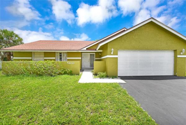 Comrock, 5610 NW 54th Ave, Tamarac, Florida 33319, image 1