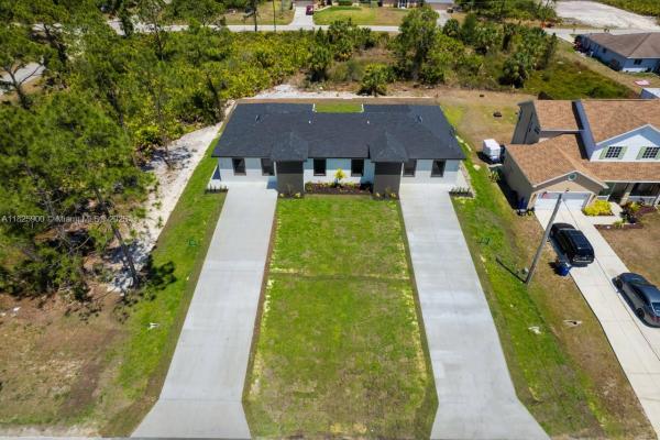 817/819 Eisenhower Blvd, Lehigh Acres, Florida 33974, image 1