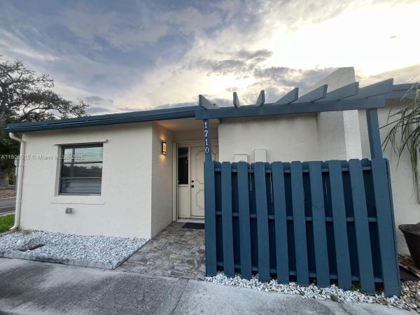 Rainbow Lakes Villas, 1710 NW 92nd Ave, Pembroke Pines, Florida 33024, image 1