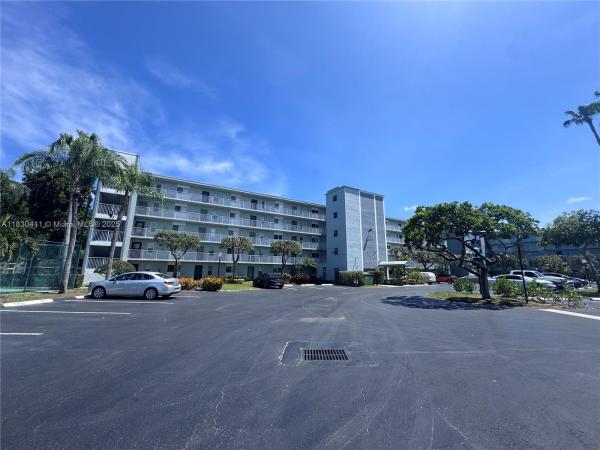 Water Chase At Cypress Bend, 2228 N Cypress Bend Dr #407, Pompano Beach, Florida 33069, image 1