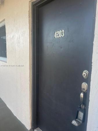 Vista Del Lago, 9917 W Okeechobee Rd #203, Hialeah Gardens, Florida 33016, image 1
