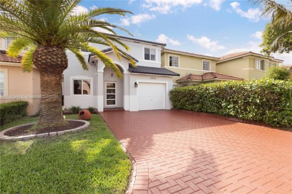 Precious Homes At Twin Lakes, 14235 SW 133rd Ct, Three Lakes, Florida 33186, image 2