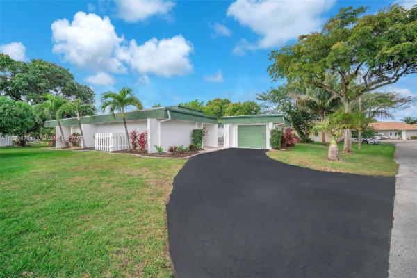 The Woodlands, 5820 Australian Pine Dr, Tamarac, Florida 33319, image 1