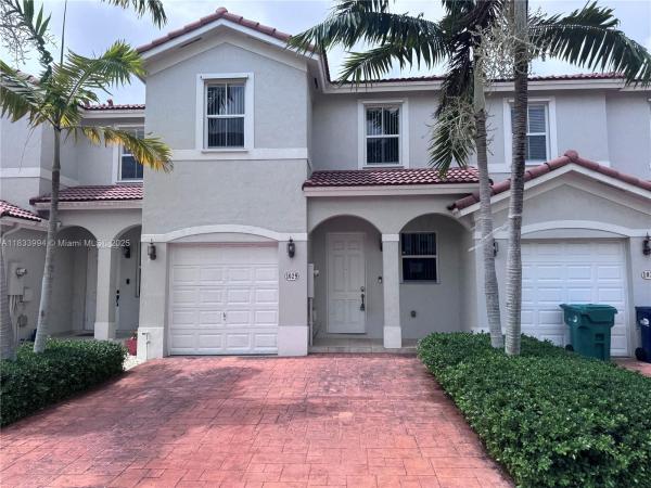 Ives Dairy Townhomes, 1029 NE 207th Ter, Ives Estates, Florida 33179, image 2