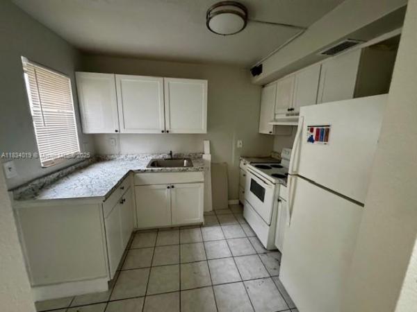 Windermere, 5208 NW 18th Ct #1K, Lauderhill, Florida 33313, image 1