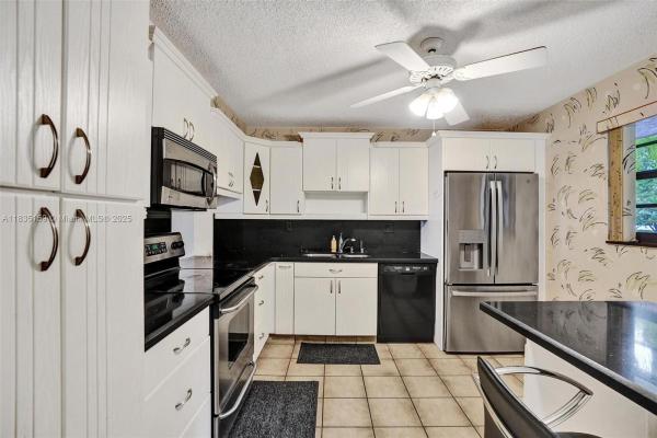 Lakes Of Carriage Hills, 4965 E Sabal Palm Blvd #207, Tamarac, Florida 33319, image 1
