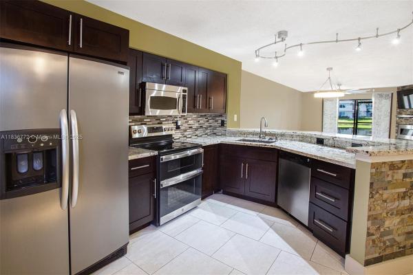 The Island At Cypress Bend, 2213 Cypress Island Dr #102, Pompano Beach, Florida 33069, image 1