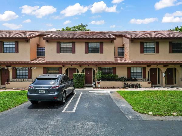 Country Club Chalet, 10942 W Sample Rd #E1, Coral Springs, Florida 33065, image 1