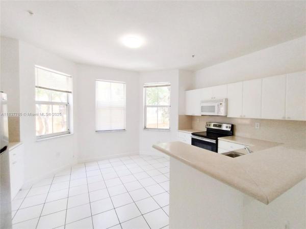 Shoma Townhomes At Royal Palm Beach, 3603 Shoma Dr, Royal Palm Beach, Florida 33414, image 1