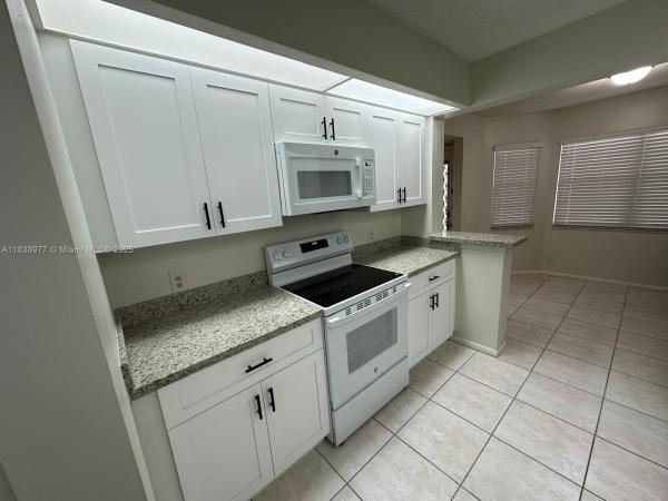 Cambridge At Century Village, 1000 SW 125th Ave #205N, Pembroke Pines, Florida 33027, image 1