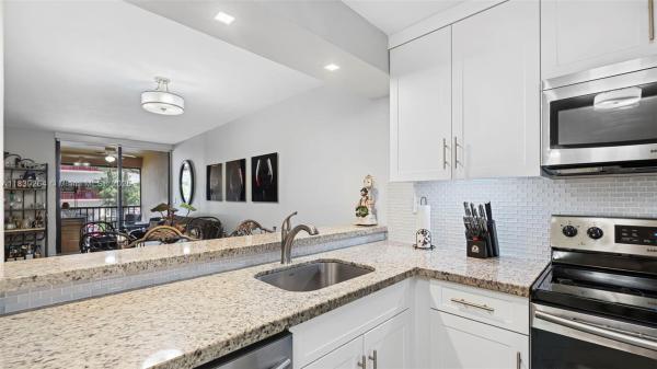 Celebration Point, 15405 Miami Lakeway N 203-1, Miami Lakes, Florida 33014, image 1