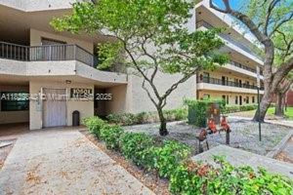 Plantation Racquet Club At Jacaranda, 10501 W Broward Blvd #407, Plantation, Florida 33324, image 1