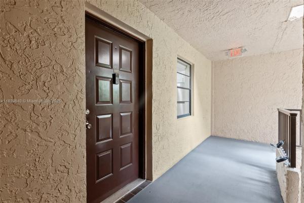 Plantation Racquet Club At Jacaranda, 10501 W Broward Blvd #407, Plantation, Florida 33324, image 2