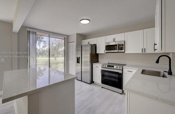 The Atrium At Woodmont, 7582 NW 86th Ter #104, Tamarac, Florida 33321, image 1