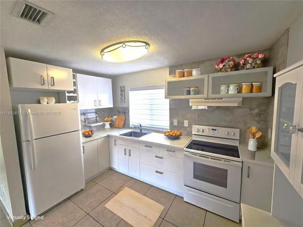 Residencial El Prado, 2775 W 61 St 203, Hialeah, Florida 33016, image 1